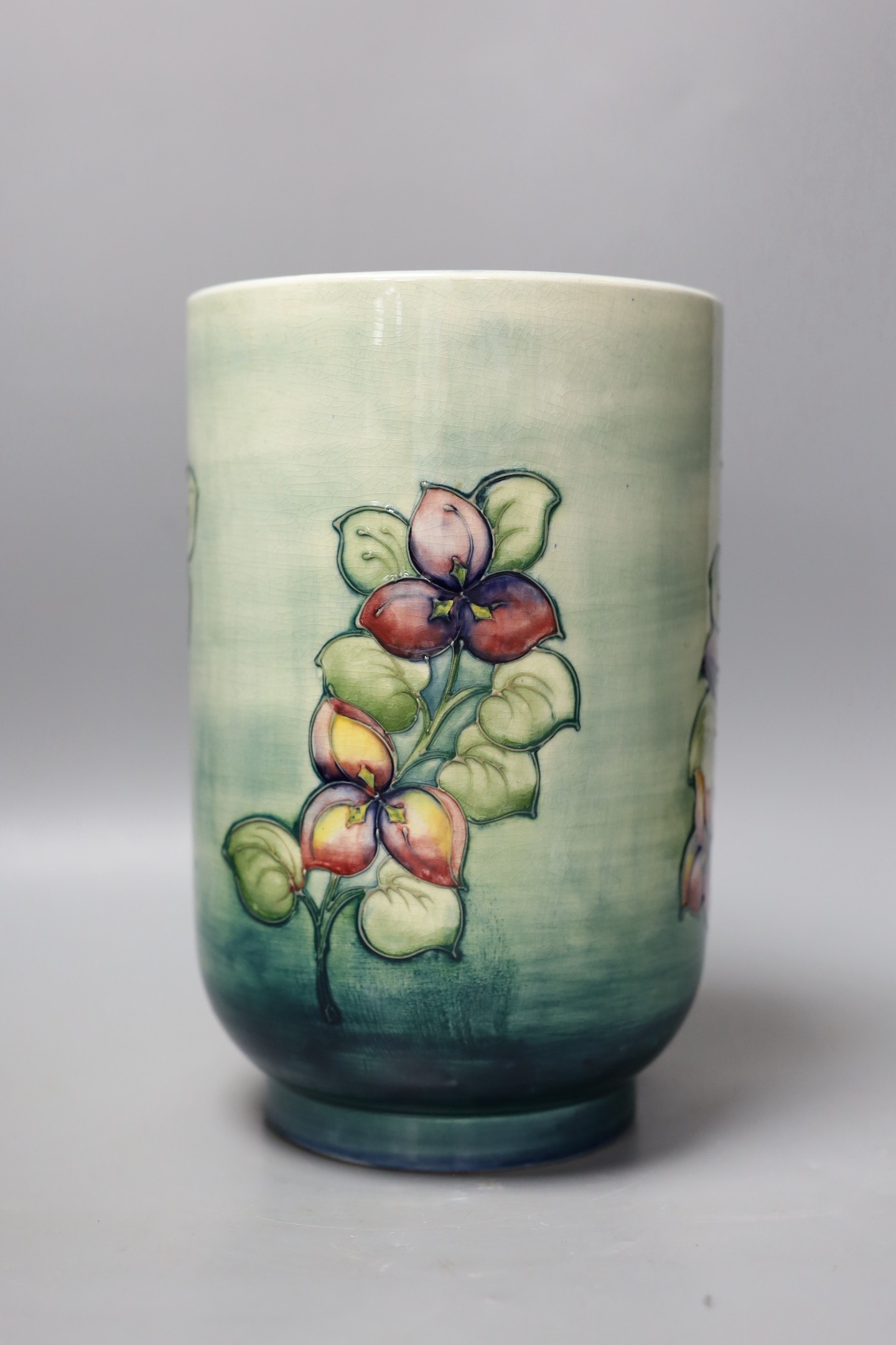 A large Moorcroft cylindrical vase, 25cm